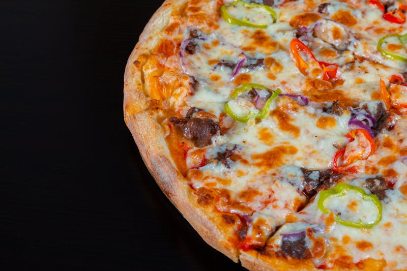 Anthonys pizza with Italian sausage and peppers